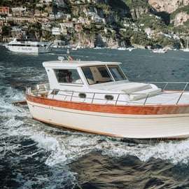 Cruzeiro ao pôr do sol em Positano num gozzo, com aperitivo